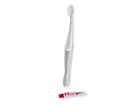 Cepillo de dientes plegable Amondo con tubo de pasta, vista lateral
