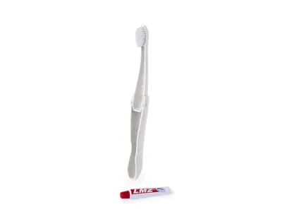 Cepillo de dientes plegable Amondo con tubo de pasta personalizable