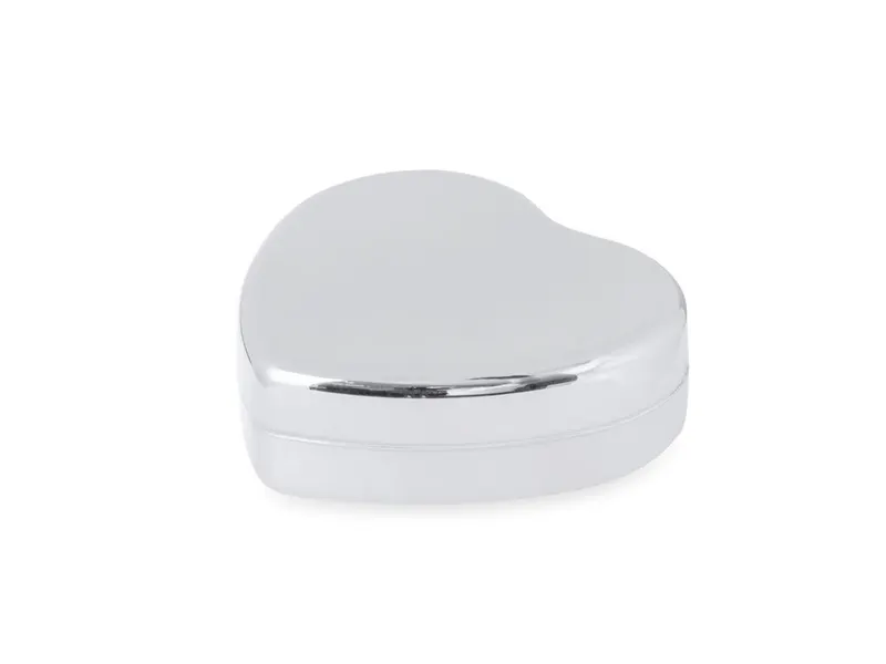 Bálsamo labial forma de corazón SPF15 Mushu en plateado, vista frontal