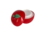 Bálsamo labial vainilla SPF15 Domicor con estuche de fruta, vista lateral